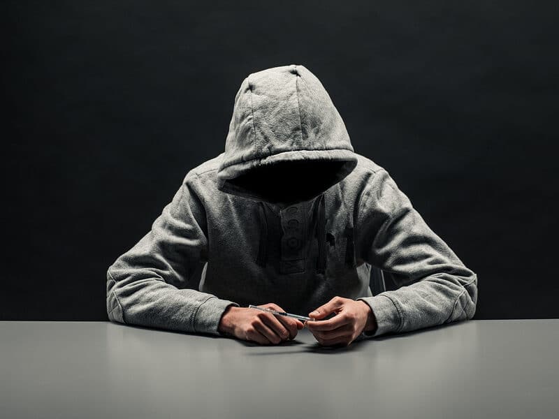 hoody man on phone can't see face