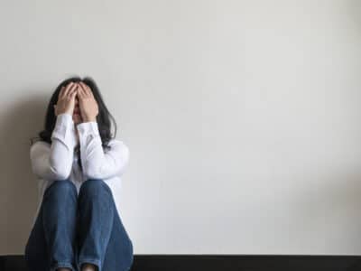 grief lady portrait sitting on floor