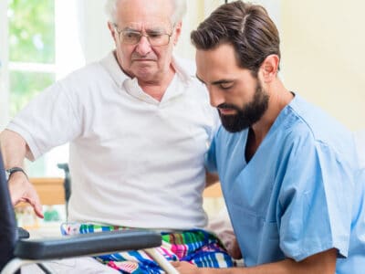 care giver and senior man