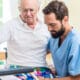 care giver and senior man