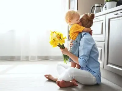 mother son and flowers gift