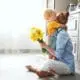mother son and flowers gift