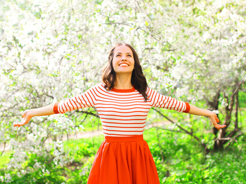 women hands out flower trees