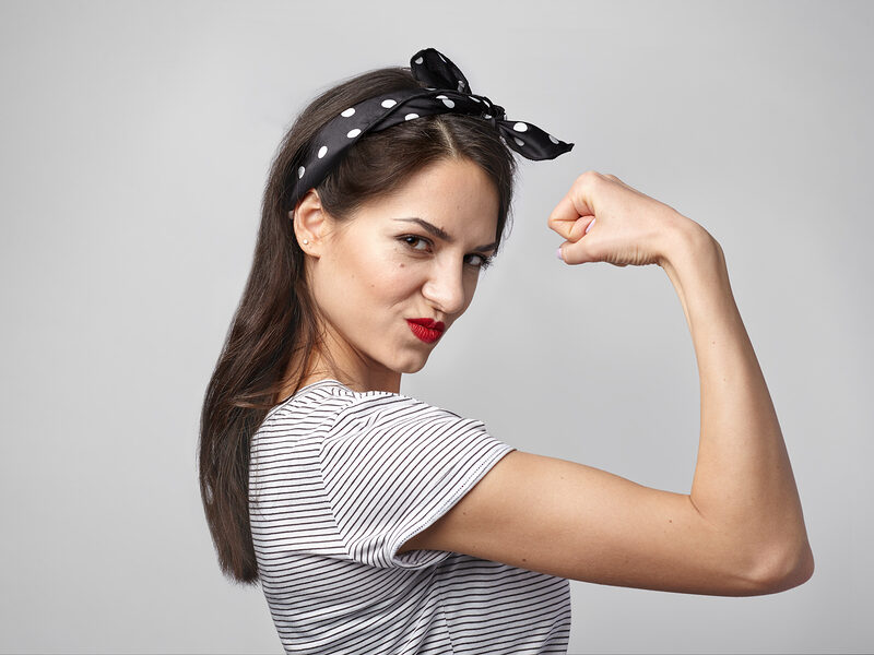 young lady muscle pose