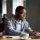 young black man on laptop