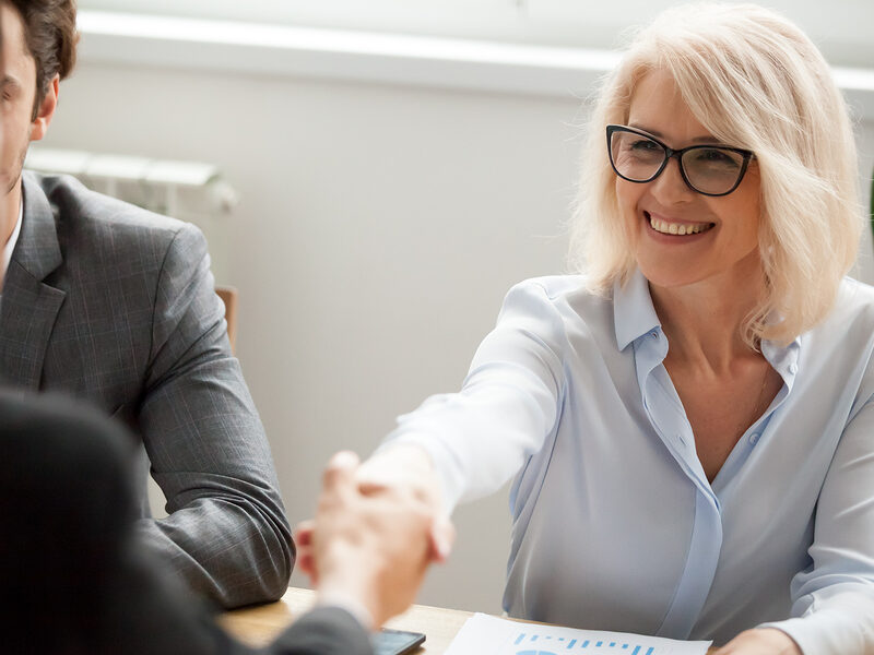 executive lady shaking hands