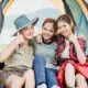 camping lady friends in tent