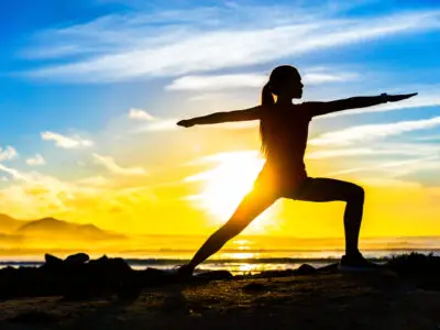 joga outdoors on shore