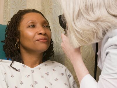 Doctor giving an exam to a woman.