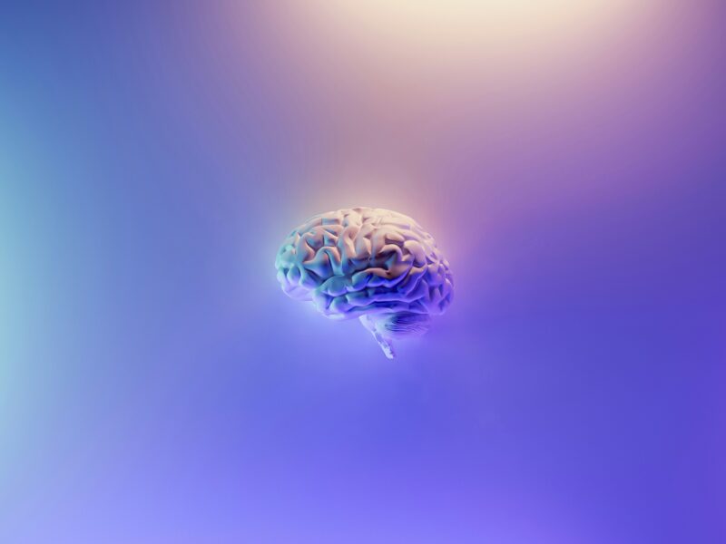 illustration of an active brain with neurons firing.
