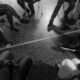 group therapy session with individuals sitting in a circle.