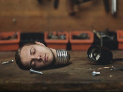 artistic depiction of what a blackout is. Lightbulb unplugged with a mans face as the bulb.