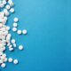 a blue blackground with xylazine pills scattered.