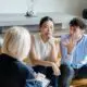 3 people sitting in a safe environment responding to an intervention